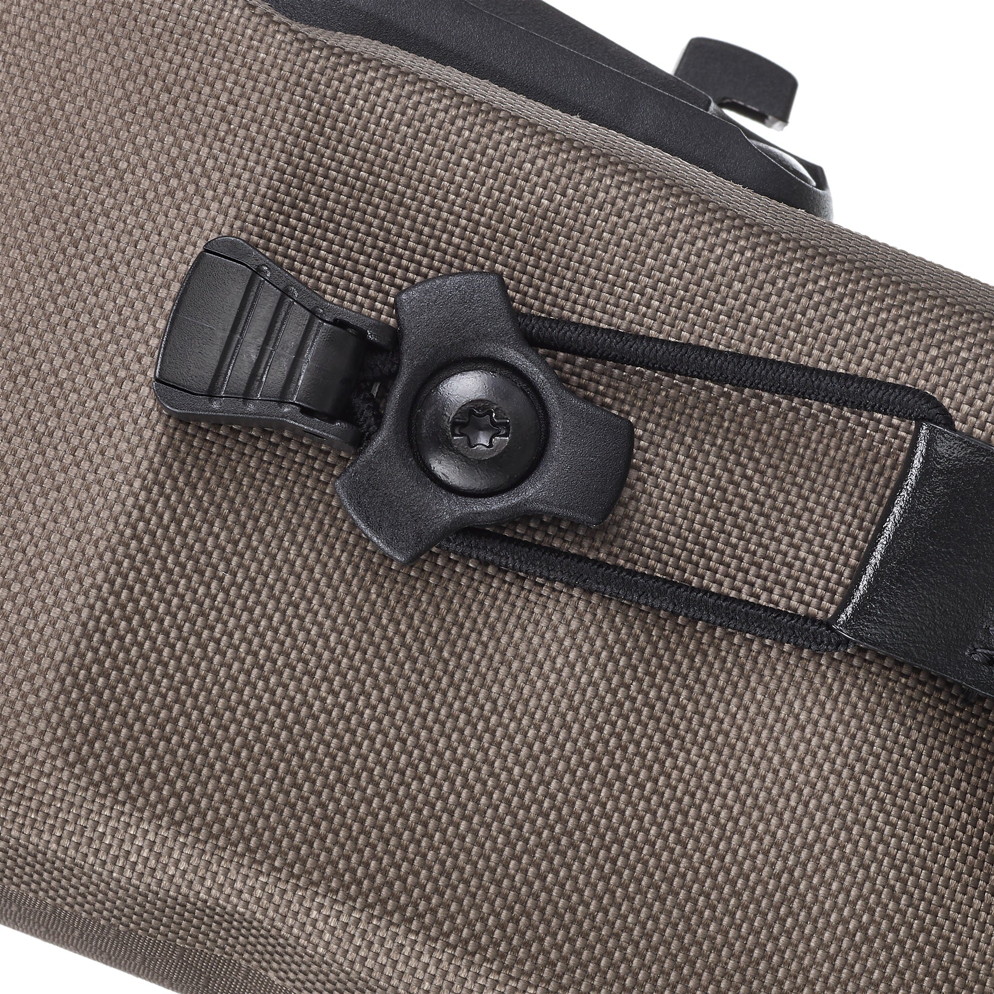 Close up of the buckle on ORTLIEB Micro-Bag 0.5L in dark sand